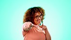 Motivation, happy and portrait of a woman with finger guns isolated on a blue background in studio. Proud, greeting and girl with a gesture for empowerment, confidence and pointing on a backdrop