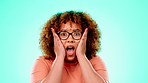 Face, surprise and black woman with facial expression, announcement and girl against a blue studio background. Portrait, African American female and happy lady shocked, good news and winner excited