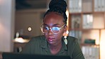 Deadline, email and black woman typing on a laptop for strategy, project management or research at night. Internet, working and African employee reading on a computer during overtime in an office