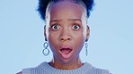 Black woman, studio and wow face by background for news, event or gossip in confused portrait. Gen z model, young african and surprise with shock, notification and trendy fashion by blue backdrop