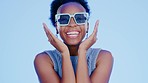 Black woman, sunglasses and face in studio with happy, excited and fashion creativity by blue background. Gen z girl, glasses or shades for vision, portrait and happiness for accessory by backdrop