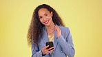 Face, phone and black woman in studio with mockup for texting, social media and app on yellow background. Portrait, smartphone and lady corporate employee online for management, schedule or planning