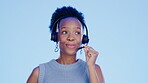 Black woman, call center and consulting for customer service in studio isolated on a blue background. Telemarketer employee, contact us or happy female consultant, sales agent or telemarketing worker