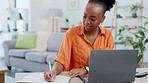 Laptop, student typing and black woman writing notes in home, research or studying online for elearning. Freelancer, remote worker and female with computer and notebook for planning or information.