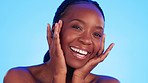 Beauty, black woman and hands on face in studio for wellness, hygiene and smooth skin on blue background. Skincare, portrait and girl model relax with luxury, glow and cosmetic result while isolated 