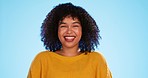 Happy black woman, face and beauty in studio by blue background for fashion, smile and wellness. Young gen z student, portrait and happy with yellow clothes, curly hair afro and confident by backdrop