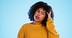 Thinking, confused and face of black woman in studio, pensive and wondering on blue background. Doubt, portrait and unsure girl with decision, choice or emoji on mockup, product placement or isolated