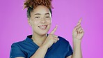 Black woman, face and pointing for advertisement, branding and announcement in studio. Isolated, pink background and young female portrait with happy news and point hands gesture from notification