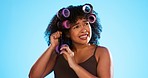 Black woman, hair and styling curlers by studio background with pain for beauty, self care or aesthetic. Gen z model, african girl and hairstyle with stress, plastic mould and anxiety for grooming