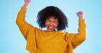 Yes, winning and happy woman isolated on blue background dancing, celebration and excited fist pump. Wow, winner and dance of biracial person celebrate prize, competition or promotion news in studio