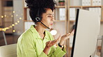 Black woman, call center and consulting on computer at night for customer service, telemarketing of support at office. African American female consultant talking and working late on PC in contact us