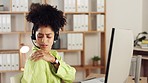 Black woman, call center and shoulder pain by computer in stress, burnout or suffering strain at office. Stressed or tired African American female agent touching painful or tensed shoulders by PC