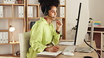 Black woman, call center and consulting or writing by computer for customer service, telemarketing or support at office desk. African female consultant talking and taking notes by PC in contact us