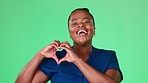 Black woman with heart hands isolated on studio background or green screen for cardiology health and care. Face of model or person with love, support and like hands, emoji for healthcare and wellness