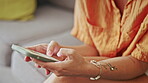 Woman, hands and typing on smartphone for connection, social media post and reading notification at home. Closeup female, mobile chat and technology app to search internet, website or digital network