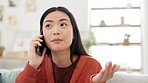 Asian woman, face with phone call and communication, talking with serious expression and technology at home. Conversation, network and contact, female in living room, hand gesturing and discussion