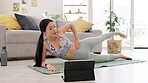 Fitness, home pilates and woman on tablet in online class, stretching muscle and workout, health or wellness support. Asian person in body exercise or yoga with digital app, web tutorial or webinar