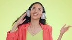 Headphones, singing and woman dancing, smile and streaming music against a studio background. Female, happy lady and headset for audio, celebration and stress relief with sounds, audio and movement