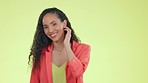 Happy, flirt and face of a woman in studio with a wink, smile and blowing a kiss for flirting. Happiness, excited and portrait of female model from Mexico with a flirty attitude by yellow background.