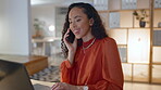 Black woman, laptop and phone call consulting, conversation or discussion in remote work at home. Friendly African American female freelancer explaining or talking on smartphone by computer indoors