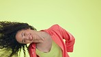 Face, shake hair and woman with smile, shine and excited girl against studio background. Portrait, female and lady with volume, move head and happiness with joy, natural curls and carefree with glow