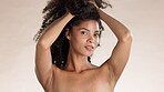 Beauty, curly hair and face of black woman in studio for self love, confidence and natural. Cosmetics, salon and glow with girl model for satisfaction, self care and happiness on studio background