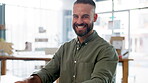 Portrait, laughing and ecommerce with a business man at work by his desk for distribution or delivery. Logistics, cargo and shipping with a happy male employee working in retail shipment or transport