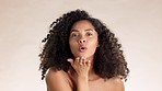 Beauty, skincare and touch with face of black woman in studio for cosmetics, satisfaction and self love. Cosmetics, confident and glow with model for clean, dermatology and spa on brown background 