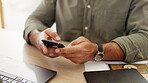 Business man hands typing on a phone at office desk for social media post, mobile app chat or networking online. Cellphone or smartphone of entrepreneur or person for email, texting or communication 