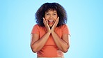 Wow, excited face and woman feeling happy from sale announcement and discount. Isolated, blue background and studio with a mixed race female portrait with smile and surprised of good news and winning