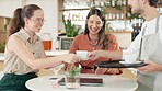 Friends at cafe, waiter with coffee and relax together, happy people and thanks with bonding and reunion. Happiness, excited and friendship date with hot drink and smile with female customer