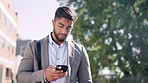 Business man, city and phone of a Indian person with a gps, social media and networking app. Outdoor, road and urban street walking of a financial management employee with mobile connection and 5g