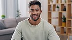 Portrait of man from India, happy in living room with smile and confidence in creative freelance job. Face of young Indian small business owner, proud gen z freelancer and remote work in home office.