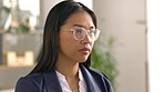 Glasses, face and serious woman on computer in office for online planning, email administration or research. Female employee working on desktop for business management, trading technology or internet