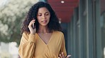 Phone call, talking and business woman in city, chatting or speaking to contact in urban town outdoor. 5g technology, cellphone or serious mixed race female with mobile for conversation or discussion