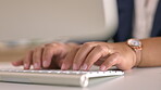 Woman, hands and typing on computer in office for data planning, online administration and seo internet update. Closeup worker, desktop keyboard and technology of research, website and business email