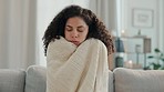 Cold, winter and woman with blanket on sofa for warmth, shivering virus and freezing weather. Sick girl, flu and freeze on couch with body hypothermia, medical illness and fever chills in living room