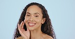 Face, beauty and skincare with happy black woman, natural cosmetics and glow on blue background. Female smile, cosmetic care and dermatology with healthy skin, wellness and facial treatment in studio