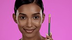 Beauty, makeup and eye shadow, Indian woman in studio with brush in hand, cosmetics and isolated on pink background. Natural skincare routine, eyes and smile, model with luxury spa or salon product.