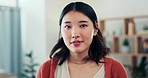 Happy, face and woman in a living room laughing, cheerful and carefree on the weekend in her home. Portrait, smile and asian girl student relax in a lounge, chilling and enjoying day off indoors