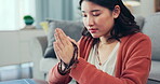 Christian woman, rosary and praying in home of spiritual faith, holy gospel and worship God. Asian female holding prayer beads with cross for bible study, religion and praise of jesus, peace and hope