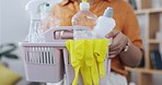 Cleaning, supplies basket and woman hands with chemical soap product for bacteria, virus or domestic house work. Home housekeeping service, hygiene girl and female worker with gloves and spray bottle