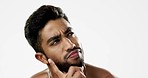 Confused, thinking and face of man in studio for wellness, skincare and hygiene on white background. Doubt, portrait and indian male model with unsure emoji contemplating beauty cosmetic or body care