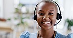 Telemarketing, face and happy black woman with a smile from customer support work. Call centre, crm and web help consultant with happiness from professional consulting with blurred background