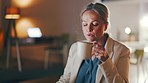 Business, woman and blowing coffee in office at night while working on computer in startup company. Female worker blow on hot cup of tea in dark for energy, caffeine break and deadlines on desktop 