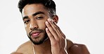 Face, hand and man in studio for skincare, smooth and soft against white background. Touching, relax and portrait of Indian male model satisfied with wellness, beauty and cosmetic care while isolated