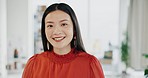 Face, happy and business woman on office, confident and empowered against a blurred background. Portrait, leader and female startup owner in Japan for career, goal and mission, vision and positivity