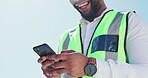 Phone, typing and engineering man hands for happy development update, mobile app chat or network. Urban outdoor architecture, construction worker black person contractor with 5g cellphone on blue sky