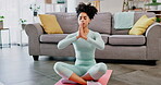 Yoga meditation, woman and praying in home for wellness, mental health and chakra energy exercise. Female, namaste hands and meditate in lotus, lounge and peace for healing, zen training and fitness 