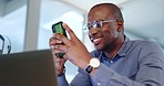 Business, smile and black man typing with phone in office for social media, internet and online networking. Communication, happy and male worker on smartphone for research, chatting and text message